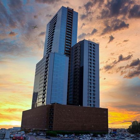 Luxe Grand Hotel Apartments Σάρτζα Εξωτερικό φωτογραφία The building at sunset
