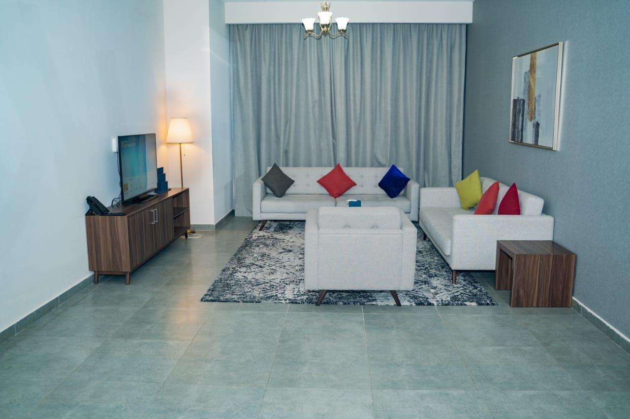 Luxe Grand Hotel Apartments Σάρτζα Εξωτερικό φωτογραφία A living room